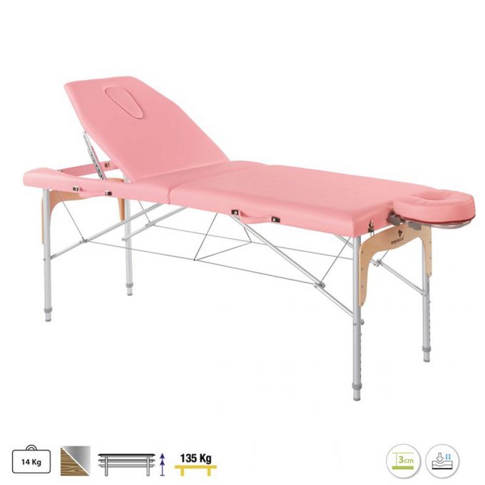 Table de massage rose avec panneau en bois et structure en aluminium légère et pliante