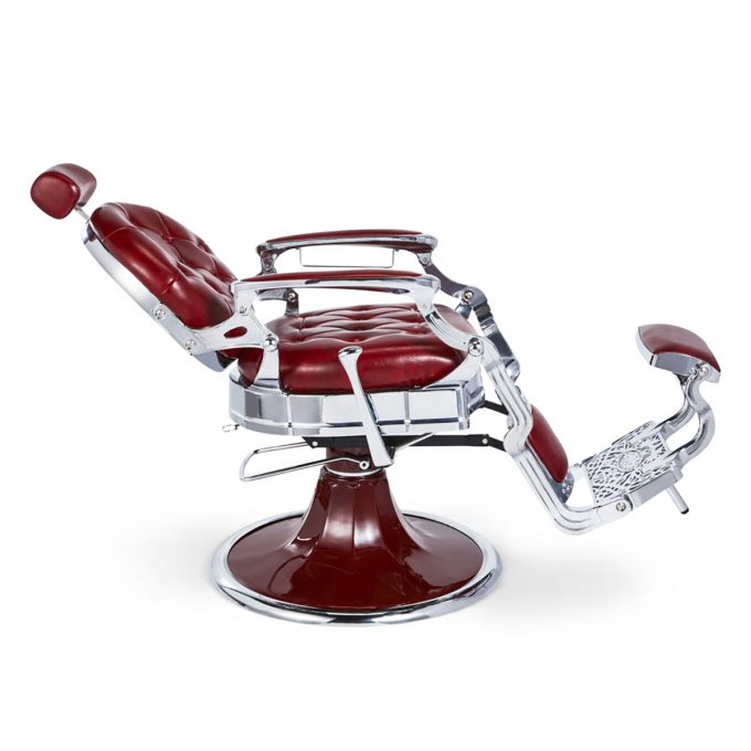 siège de barber shop en métal chromé avec revêtement en similicuir rouge profond, appuie tête et repose jambes réglable, dossier inclinable
