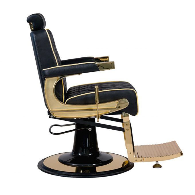 fauteuil de barbier structure en métal doré avec similicuir noir et surpiqures en losanges doré, réglable en hauteur et inclinable