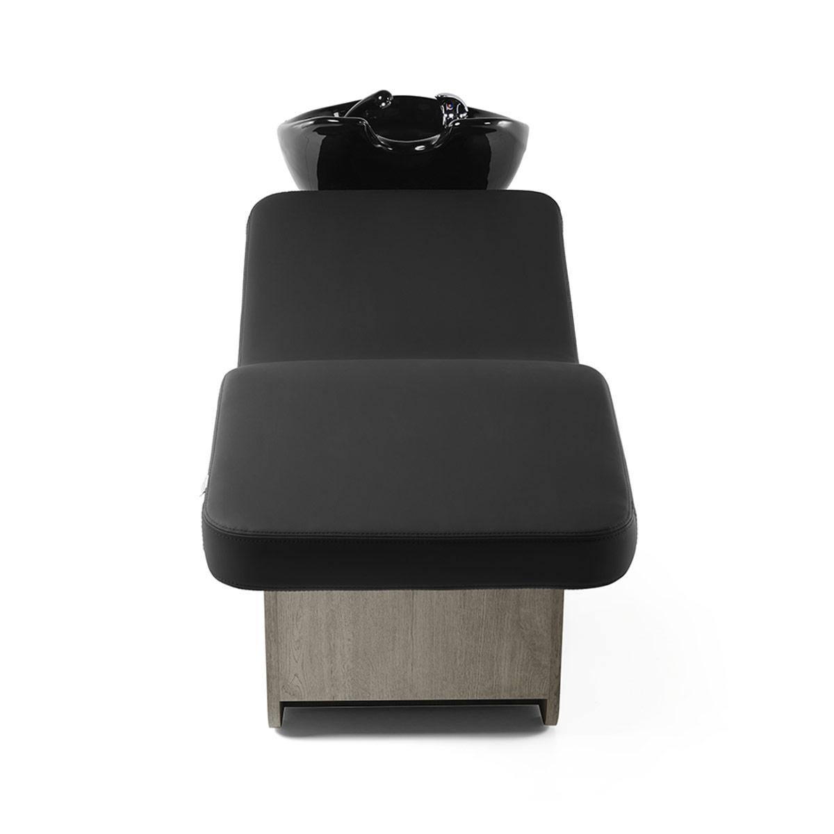 Bac à shampoing en position allongée, idéal pour un moment de détente exceptionnel, finition stratifié et similicuir et couleur vasque aux choix