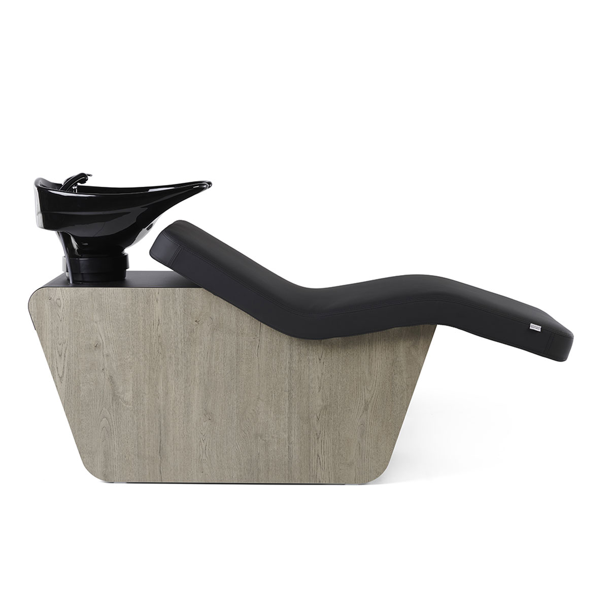 Bac à shampoing en position allongée, idéal pour un moment de détente exceptionnel, finition stratifié et similicuir et couleur vasque aux choix