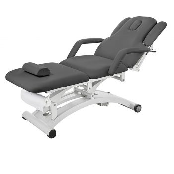 Table de massage électrique SPHEN DARK GREY de couleur gris foncé, équipée de trois moteurs, dossier inclinable avec ouverture faciale, accoudoirs modulables, coussins ergonomiques et base semi sphérique stable avec roues intégrées, destinée aux soins de physiothérapie et de rééducation.