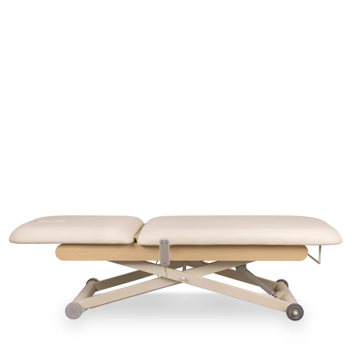 Table de massage électrique DRACO CR OAK avec structure finition bois chêne, hauteur réglable, dossier inclinable, coussin épais en PVC, repose-tête amovible avec cavité faciale et roulettes intégrées.