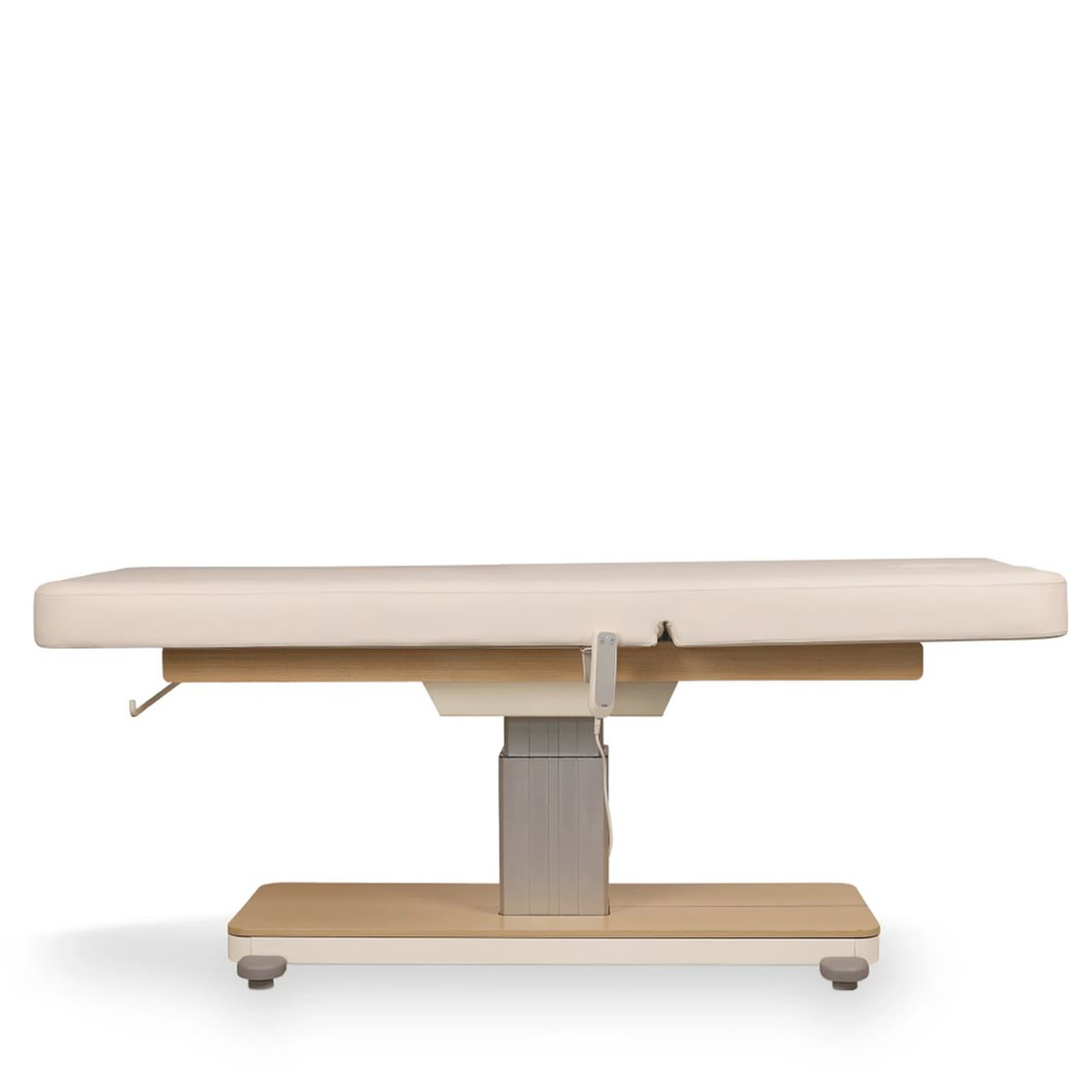 Table de massage ORION CR OAK avec base centrale robuste finition bois, revêtement PU crème, réglage électrique, dossier inclinable, coussin amovible avec ouverture faciale et porte-rouleau intégré.